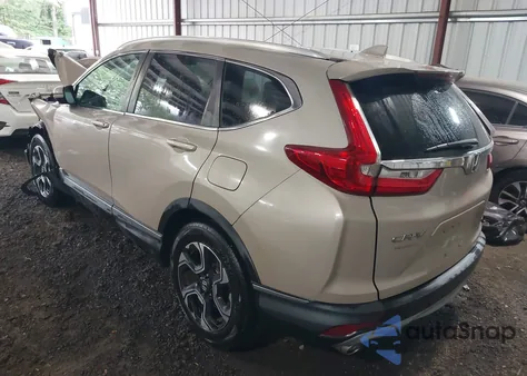 2019 Honda Cr-V Touring z USA, uszkodzony, nr VIN 2HKRW1H96KH502032
